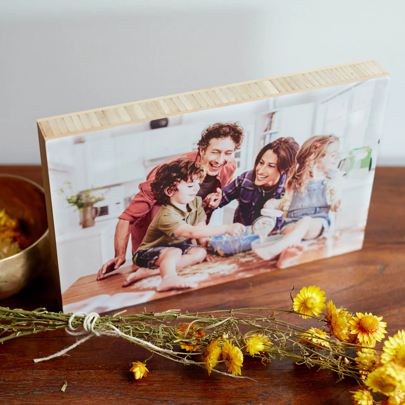 Bamboo rectangle block with family in kitchen
